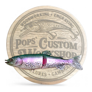 Hand‑painted 7-inch Rainbow Trout glide bait with realistic color‑shift finish from Pops&rsquo; Custom Workshop.